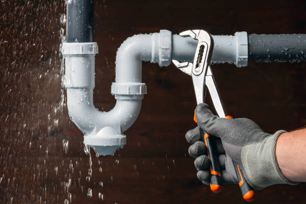 Professional Drain Cleaning technician working in Quaker City, OH